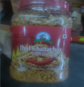 Image of Jhal Chanachur food in a clear plastic container.